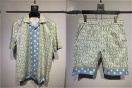 23 Summer Fashion Mens pilas de pistas Hawaii Beach Set Designer Shirts Impresión de la camisa de ocio Hombre Slim Fit the Board Directores Manga corta Playa corta ZP222
