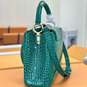 23FW reliëf lederen bakken handtas vrouwen capucines emmer bakken luxurys ontwerpers tassen crossbody messenger pouch reis handtas 21 cm achtervolging