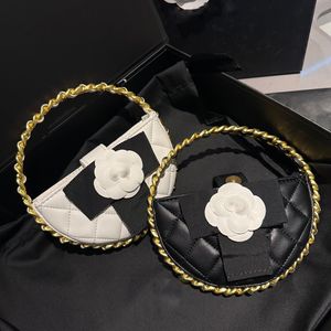 23k cc sac designer femmes sac de banquet circulaire poignée en métal tissé sac de transport décoration d'arc de fleur en trois dimensions sac à bandoulière unique sac à bandoulière