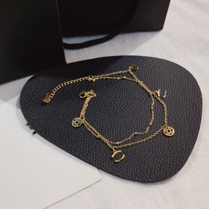 23ss 11style Mujeres Luxury Desinger Tobilleras Verano 18K Chapado en oro Acero inoxidable Colgante Cadena Pierna Joyería Accesorios de moda Regalo