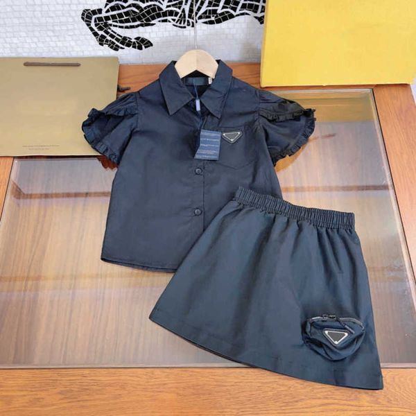 23ss Baby Set Kid Sets Camisa Trajes de falda Niños Diseñador Solapa Manga de encaje Bolsillo en el pecho Cintura elástica Faldas Traje Ropa de alta calidad A1