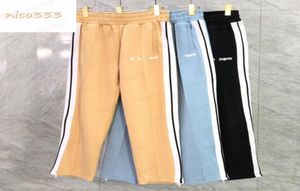 23ss pantalon classique côté noir blanc rayé jambe fermeture éclair lâche et polyvalent multi couleur rue hommes et femmes pantalons de survêtement 1088370