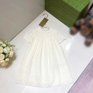 23ss filles Robe Robes à manches courtes vêtements de créateurs pour enfants Couleur unie Col de poupée Évider Bord en dentelle Robe à manches courtes grandes Filles jupes vêtements pour enfants