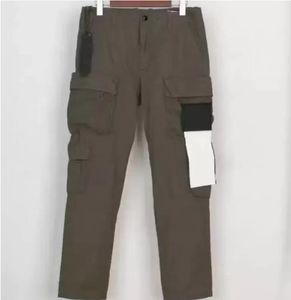 23SS hoogwaardige badge patch patch heren track broek mode alfabet ontwerp jogger broeken vrachtbroek zipper vlieg lange trackpants