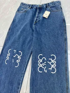 23SS Italië parijs heren paarse jeans Casual Street Fashion Zakken Warme Mannen Vrouwen Paar Uitloper denim blauwe broek gratis schip 0725