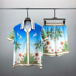 23ss Diseñadores para hombre Conjunto de chándal Conjunto de lujo Camisas hawaianas de moda clásica Chándales Pantalones cortos con estampado de piña Camisa Traje de manga corta # 036