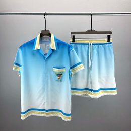 23ss Diseñadores para hombre Conjunto de chándal Conjunto de lujo Camisas hawaianas de moda clásica Chándales Pantalones cortos con estampado de piña Camisa Traje de manga corta # 040