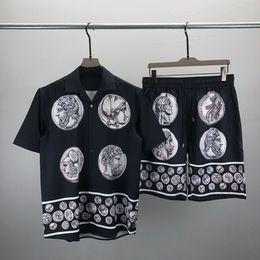 23ss Diseñadores para hombre Conjunto de chándal Conjunto de lujo Camisas hawaianas de moda clásica Chándales Pantalones cortos con estampado de piña Camisa Traje de manga corta # 024