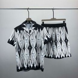 23ss Diseñadores para hombre Chándal Conjunto de lujo Clásico Moda Camisas hawaianas Chándales Pantalones cortos con estampado de piña Camisa Traje de manga corta # 029