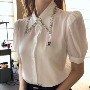 23ss Nueva camisa Diseñador Blusa Primavera Verano Polo Collar Rhinestone Manga corta Top Letra Bordado Puff Manga Cardigan Camisa para mujer