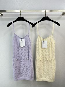 23SS Sexy Femmes Designer Robe Tricots T-shirts Robes Avec Diamant Évider Filles Débardeurs Vintage Piste De Luxe A-ligne Mini Jupe Sans Manches Camisole Tee robe