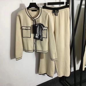 23SS Survêtements femmes pulls de créateurs femmes tricots ensemble costume lettre à la mode et décontractée couples imprimés mêmes vêtements S-xxXL