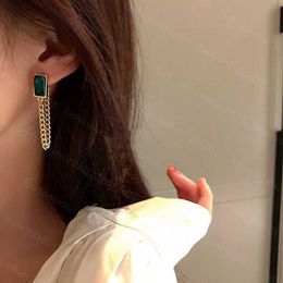 23ss femmes boucles d'oreilles design Swarlow vert grand-mère cristal diamant gland chaîne boucles d'oreilles haute qualité accessoire femmes bijoux