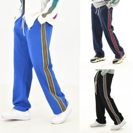 24 Luxurys Designer Mens Pants Agujas Pantalias Bordado Bordado Bordado Correo Patchwork Elástico Trabajo con pantalones Running Casual Loose Jogging