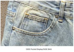 24 jeans pour hommes shorts en jean déchiré en bleu clair pantalon pantalon tendance allmatch lâche en laine divisée courte 230519