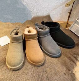 24 Le même modèle pour les célébrités Internet Hot Women Ultra Mini bottes de neige Doux et confortable Peau de mouton garder au chaud avec un sac à poussière en carte Beaux cadeaux