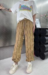 24 Pantalons serrés du ruban de fleur pour femmes avec tissu à double imprimé / taille à crampon / motif étonnant 417