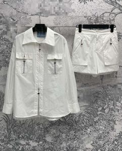 24 Sigle de chemise à glissière de poche blanche pure féminine avec collier à collier zipper haut de taille haut de taille polyvalent 514