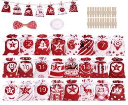 24pcs Calendrier Candar Smagche décoration de Noël Décoration Coundre Avent Sac Calendrier Sac à crampons Satin 2022 Sac cadeau de Noël Set2408518