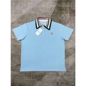 24SS Casablanca Polos para Hombre Nuevo Polo con Mangas Cortas Azul Claro Sueltas e Informales para Hombres y Mujeres casablanc