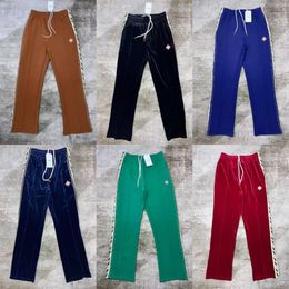 24ss Casablanca Nouveaux hommes Pantalons de créateurs Classique Chaud Sportif Coloré Bande Côté Tissage Sangle Casual Signe Brodé Casual Sport Pantalon Tendance Zipper Manteau Top Costume