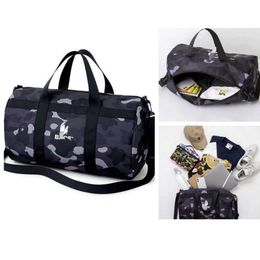 24SS Designer Ape Bag Bapestar Japanse tijdschrift bijlage tas Ape Head ronde emmer buiten waterdichte reistas zwart-wit camouflage kleur handtas