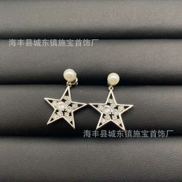 24SS Designer Channel Miu Family's nieuwe Heavy Industry Love Star-oorbellen en oorbellen voor dames Lichte luxe geavanceerde asymmetrische strikknoopoorbellen