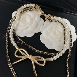 24SS Designer Channel Xiangjia 23 Été Nouvelle chaîne de perle empilée portant du cuir de vent portant un long nœud en mousque