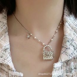 24SS Designer Channel Xiaoxiangfeng 23 Internet célèbre collier de sac de perles tissé à la main industrie lourde haut de gamme sentiment tempérament colliers et accessoires mondains
