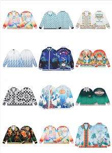 24ss Camisa de diseñador Camisas con botones para hombre Camisa de bolos con estampado Hawaii Floral Camisas de seda casuales Hombres Slim Fit Vestido de manga corta Casablanc Camiseta hawaiana