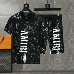 24SS diseñadores para hombres set de chándal de lujo de lujo camisas hawaianas de la camiseta de huerto con estampado de piña camisa de manga corta #063