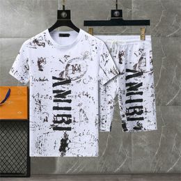 24SS diseñadores para hombres set de chándal de lujo de lujo camisas hawaianas de las camisas de huerto estampado de piña camisa de manga corta #064