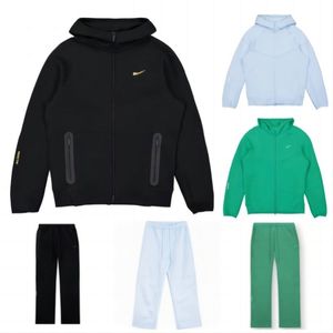 24ss Mens Sports Nocta Chándal Diseñador Sudadera con capucha Pantalones Conjunto Traje de dos piezas Hombres Mujer Suéter con capucha Techfleece Pantalones Trajes de pista Fondos Correr Joggers