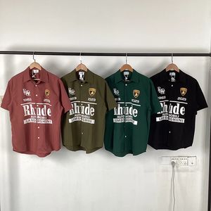 24SS nuevas camisas multicolores de manga corta para hombres y mujeres 1 ropa de calle estampada a la moda camisetas hawaianas holgadas con botones hawaianos