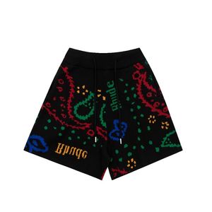 24SS Rhude Shorts coloridos pantalones cortos de flores de anacardo Americano High Street Casual Loose Burnet Quarter Pants para hombres y mujeres