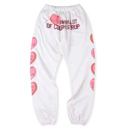 24ss pantalones de chándal size size hombres hip hop que es una gran cantidad de jarabe de tos joggers estampados de estampado de vestir