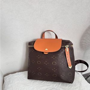 24SS Mujer de lujo de lujo mochila bolso de cuero bolso de compras de cuero bolso de hombro para mujeres bolsas para el libro de hombro al aire libre