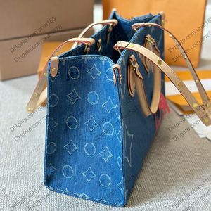 24SS damesretiro bakken denim tassen lederen klassieke bloemen lederen handtas luxurys shouder crossbody messenger dames reis handtassen zakje portemonnee 34 cm