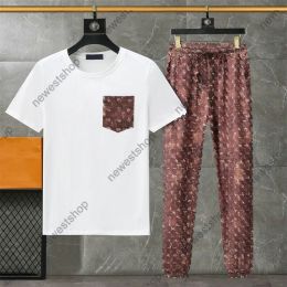 24SS Designer Dames Tracksuits Europe 2 -Piece Sets Luxe sportpak met korte mouwen Streetwear Pocket Print Tracksuit Mannelijke ademende sportpakken