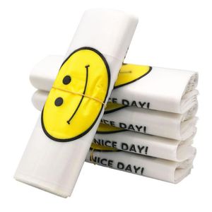 26 * 42 cm Bolsa de alta calidad HDPE Supermercado Amarillo Sonrisa encantadora Chaleco blanco Portador de plástico Compras Bolsas de embalaje a mano