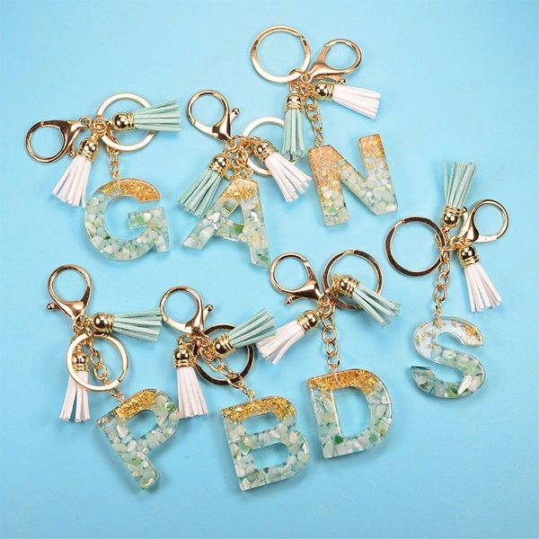 Porte-clés en résine pour femmes, 26 lettres A-Z, pendentif de sac en feuille d'or, breloques, accessoires de sac à main, pompon, porte-clés, cadeau