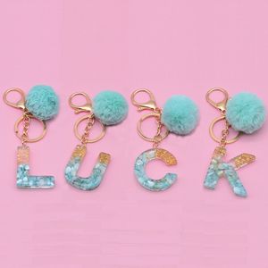 26 initiales lettre porte-clés avec boule en peluche femmes sac à main clé de voiture pendentifs ornement paillettes résine Alphabet porte-clés accessoires