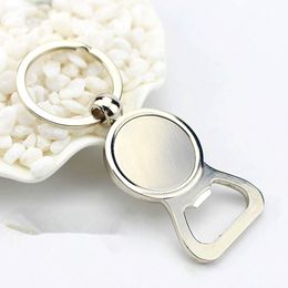 Free Shipping 100pcs /Lot New Bottle Opener Keychains Round Keyrings For Gifts Zinc Alloy Keychains Men Women Souvenirs Car Bag Pendant