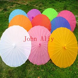 Hot selling new solid 10 colors Chinese long-handle paper umbrellas for wedding party favor for guest great gift