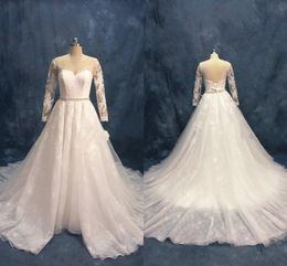 Abiti da sposa a maniche lunghe in pizzo vintage con cinturini in cristallo con scollo a V aperto sul retro Abito da sposa bohémien con lacci Abiti da sposa taglie forti