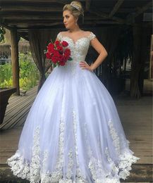 2020 New Sexy Ball Gown Wedding Dresses Illusion Neck Cap Sleeves Tulle Lace Appliques Beaded Sexy Button Back Plus Size Bridal Gowns