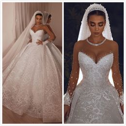 2020 Arabisch Aso Ebi Spitze Perlen Kristalle Brautkleider Sheer Neck Long Sleeves Brautkleider Sexy Vintage Brautkleider ZJ522