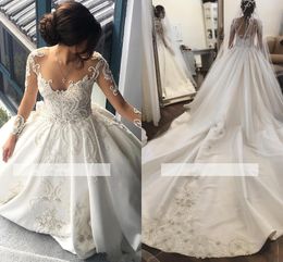 Vintage Illusion Long Sleeves Wedding Gowns Dress Lace Applique Beaded Sheer Neck Backless Ruffled Long Train 2022 Satin Bridal Gown
