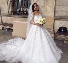 Charming dubai Arabic A Line Wedding dresses Elegant Off Shoulder half sleeves 2019 Cheap Lace wedding dresses Vestido