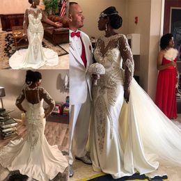 2020 Arabic Elegant Mermaid Wedding Dresses Jewel Neck Illusion Lace Appliques Beads With Detachable Train Sexy Hollow Back Bridal Gowns